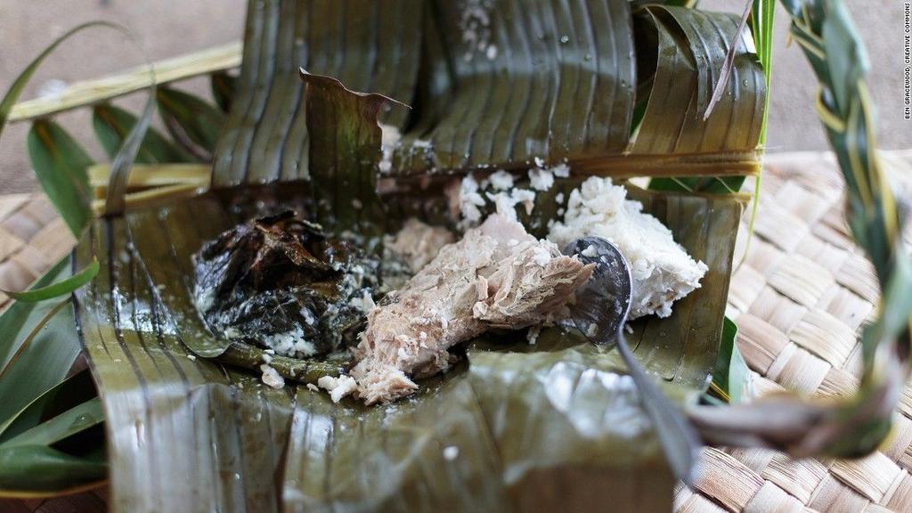 Umu (Samoa) A fish is wrapped in taro leaves ahead of being cooked. Umu, Samoa's version of the barbecue, is similar to the underground cooking customs of Fijian love.