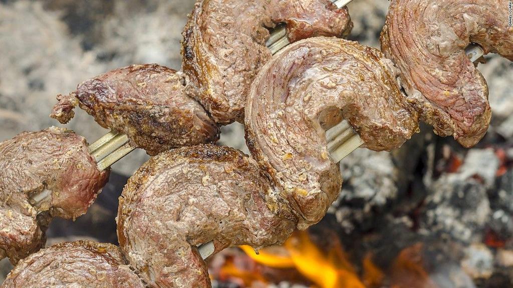 Meats were skewered on metal spits, seasoned with coarse salt, and grilled, then the skewered meat