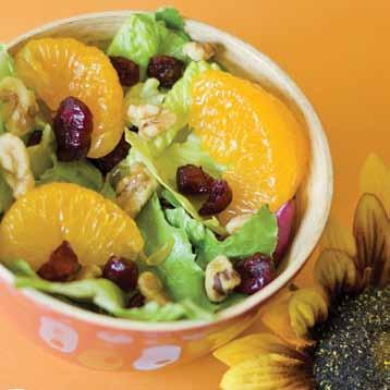 SaladS Orange Berry Salad Mix mandarin oranges, lettuce, dried cranberries, mandarins, and walnuts in a bowl. Squeeze juice from oranges onto the salad. Toss, serve and enjoy!