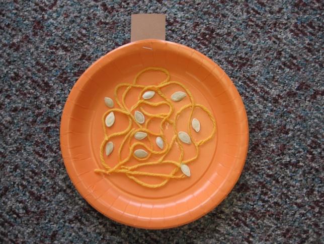 Content Area Science: Investigation Fine Motor: Manipulative Movement Objective Students will: Explore the insides of a pumpkin Identify seeds Orange paper plates Glue Yellow, gold, or orange yarn