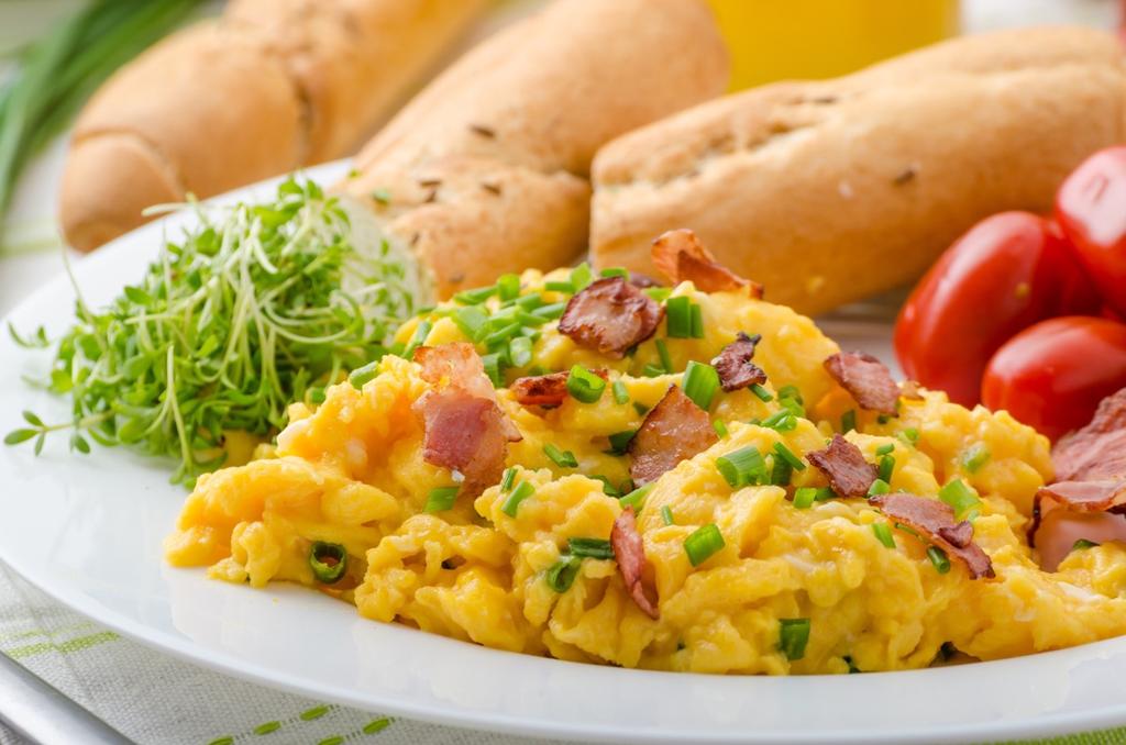 E Eggs With Ham, Cheddar, and Chives Easier to make than an omelet, your kids will love these simple additions to morning eggs.