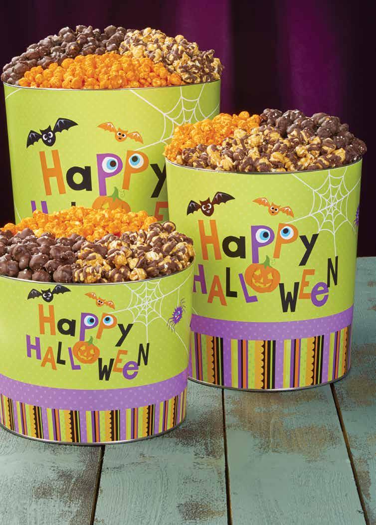 HAPPY HALLOWEEN DELUXE POPCORN TINS Decadent Double Cheddar, Dark Chocolate Sea Salt and Drizzled Caramel popcorn flavors are made with the finest ingredients to delight the most discerning popcorn