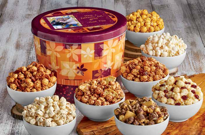 A B C A FALL SPLENDOR TIN POPCORN ASSORTMENT For the popcorn lovers, we fill a 2-gallon tin with 8 flavors of popcorn: Caramel, White Cheddar, Cracked Pepper & Sea Salt, S Mores,