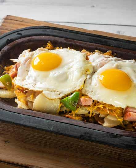 HEARTY SKILLETS All skillets are served with choice of Shed sides. SHED SKILLET* 9.29 Fresh green peppers, onions and smoked ham topped with Colby cheese and two AA eggs, cooked as you like them.