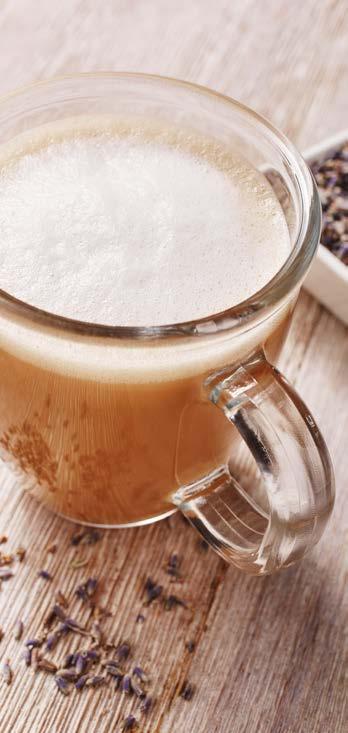 COFFEE WITH WARM LAVENDER STEAMED MILK Combine boiling water and coffee concentrate and pour into two mugs. Steam milk and lavender extract until hot and frothy.