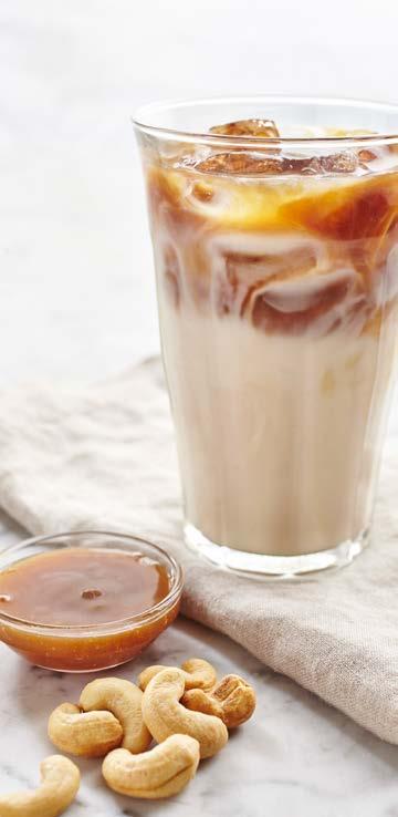 CASHEW CARAMEL ICED COFFEE Combine milk, syrup, coffee concentrate and mix well.