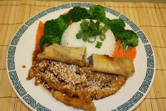 00 Perfectly grilled chicken smothered in our house sesame ginger sauce and steamed vegetables-broccoli, zucchini & carrot.