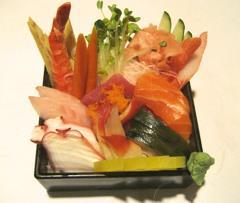 95 Sashimi Deluxe* Your choice of Soba noodles or Rice with Sashimi and