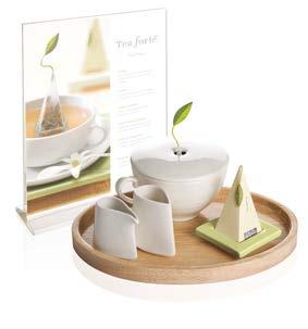 suggested product presentation > minteas compact bamboo counter display Attractive bamboo display grabs customers attention and drives impulsive purchases. Space efficient, beautifully holds 30 tins.
