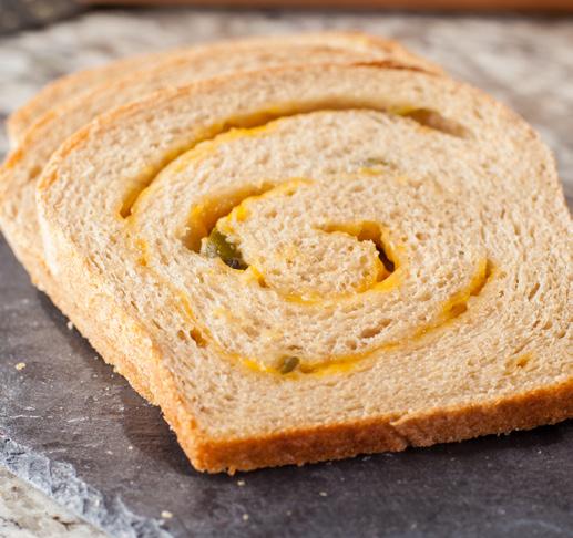 4 Cinnamon Raisin Bread Roll or press a loaf of dough into a long, narrow rectangle. Spread with melted or softened butter, if desired.