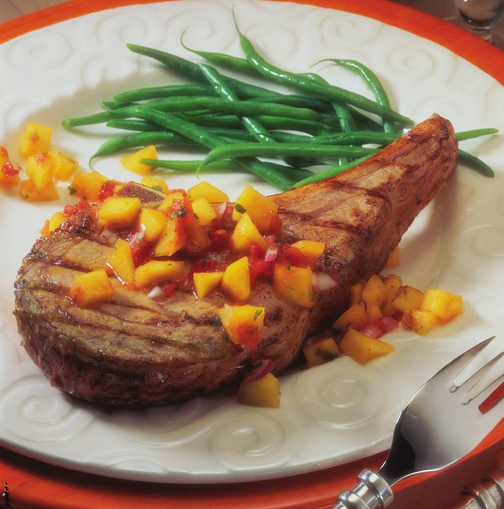 Citrus-Rubbed Veal Chops & Mango Salsa makes 6 servings 6 well-trimmed veal rib or loin chops, cut 1 inch thick (about 8 ounces each) 1/2 teaspoon salt 1/2 teaspoon grated lime peel Fresh mint sprigs