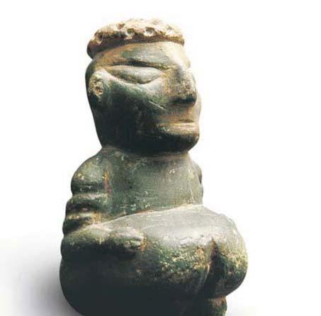 A 9,000-year-old baked-clay figurine found in Catal Huyuk Catal Huyuk In 1958, archaeologists discovered the agricultural village now known as Catal Huyuk (chuh TUL hoo YOOK), or the forked mound.