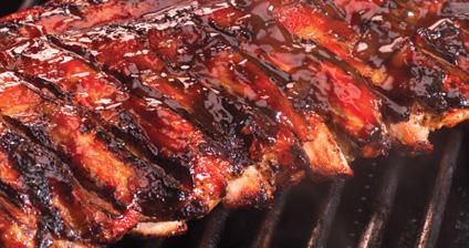 rizzly s Famous Wood-Roasted Chicken Baby Back Ribs WOOD-SMOKED & OFF THE SPIT ENTRÉES All are served with your choice of soup or salad (or another side if you prefer) and your choice of one side.