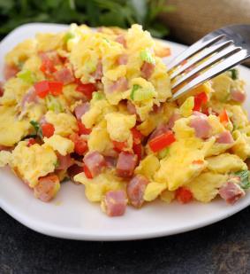 Ham and Egg Scramble 2 whole eggs, large 2 ounces ham, chopped ½ onion, medium, chopped ½ green bell pepper, medium, chopped 1 ounce cheese (any type) 2 cups berries (i.e., blueberries, In a large bowl, beat together eggs.