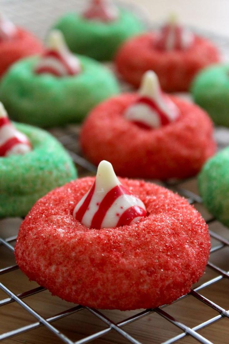 Candy Cane Blossoms Makes 4 Dozen cookies 350 F 48 HERSHEY S KISSES Brand Candy Cane Mint Candies ½ cup (1 stick) butter or margarine, softened 1 cup granulated sugar 1 egg 1 ½ teaspoons vanilla