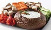 00 Dill Dip Appetizer Tray A fresh baked bread bowl filled with creamy dill dip served with rye