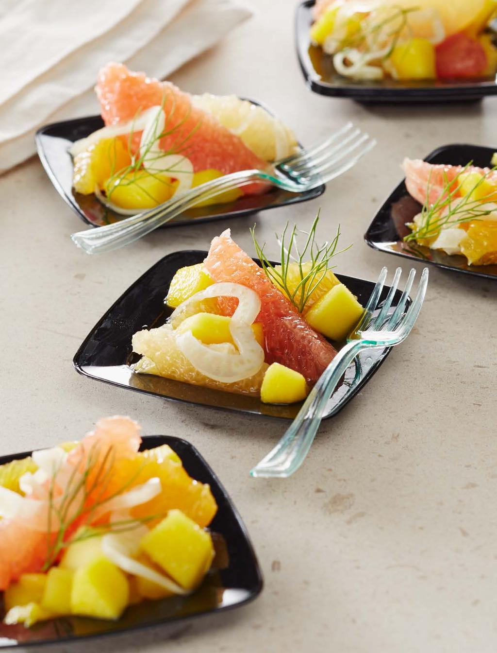 Sliced Citrus Salad on a disposable square plastic black plate helps you serve with style.