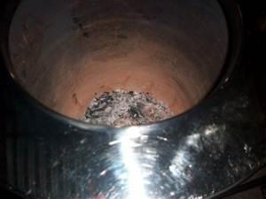 Be CAREFUL there are no coals still in the ash when you wipe out the Tandoor.