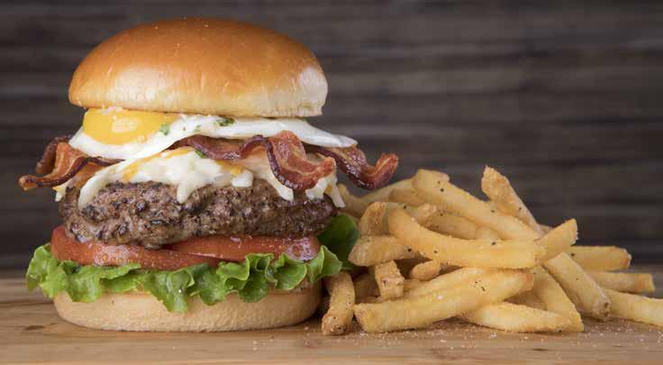 BLEU RIBBON BURGER* Applewood bacon, bleu cheese crumbles, cheddar cheese, lettuce, tomato, red onions and pickles.