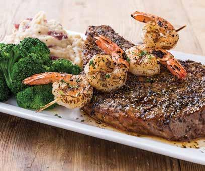ENTRÉES Add a side salad or soup 16 OZ. BONE-IN RIBEYE* USDA Choice chargrilled ribeye finished with steak butter. Served with garlic mashed potatoes and seasonal vegetables.