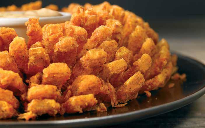 BLOOMIN ONION AUIE-TIZER BLOOMIN ONION An Outback Original! Our special onion is hand-carved, cooked until golden and ready to dip into our spicy signature bloom sauce. 8.