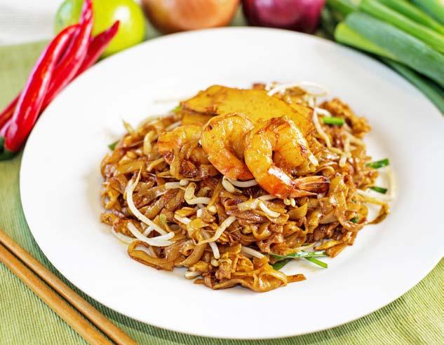 9 Malaysian styled fried noodles with prawn, squid, tofu, bean shoot & veggies N04. Maggie Mee Goreng 马来美极炒面 $11.