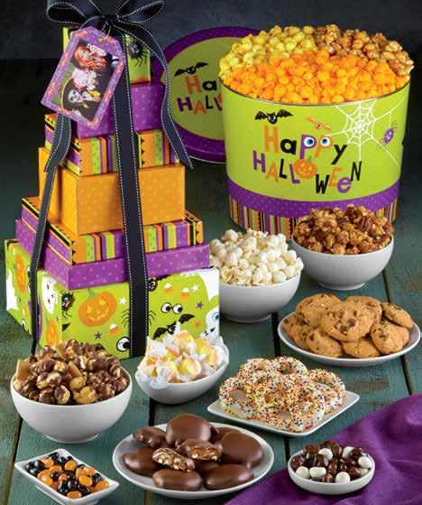 99 B HAPPY HALLOWEEN SNACK CARRIER Whether you travel by broomstick, dragon or on foot, the cut out handle on our party pack snack carrier ensures you bring the goods in style!