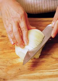Repeat for the second onion half, chopping the onions from the last few