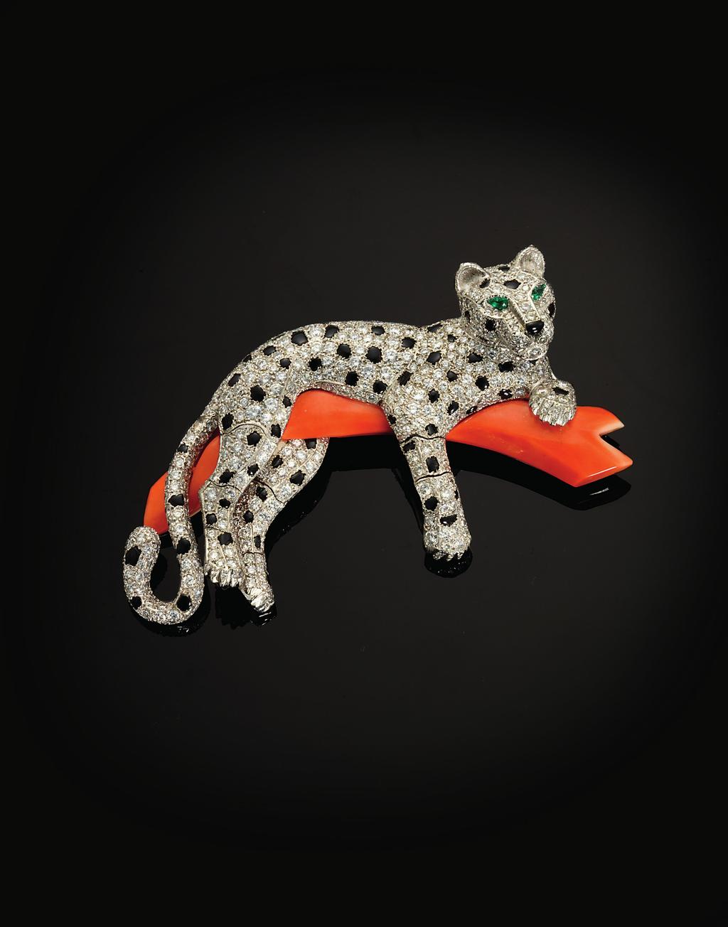 CORAL, ONYX AND DIAMOND PANTHER BROOCH, BY CARTIER, CIRCA 1978 60,000 100,000 Important Jewels London, King Street 3 June 2015