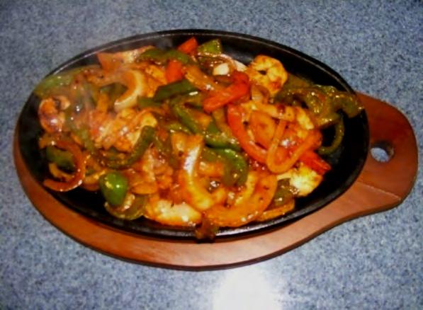 00 SHRIMP or fish FAJITAS Marinated with our house salsa and sautéed vegetables - 12.00 CASA FLORES SPECIALTIES Served with rice and beans. Tortillas available upon request.