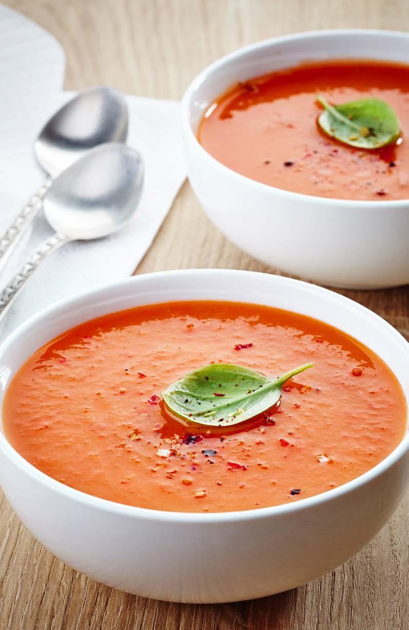 CREAMY TOMATO SOUP SERVES: 6 8 TIME: 20 MINUTES 3 cloves garlic, pressed OR minced 1 tablespoon coconut oil two 28-ounce BPA-free cans salt-free diced tomatoes one 14-ounce can coconut milk ½