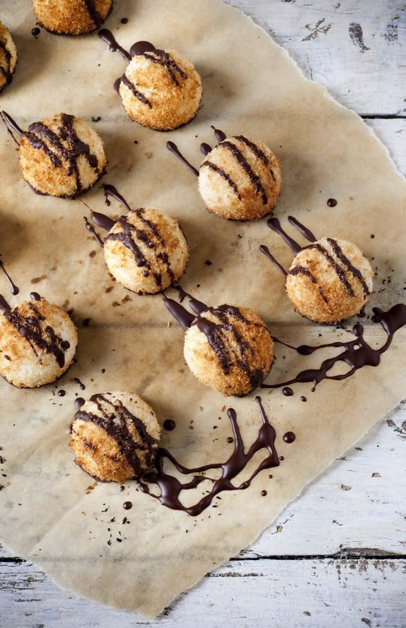 PROTEIN COCONUT MACAROONS SERVES: 48 MACAROONS TIME: 20 MINUTES 6 egg whites ¼ teaspoon sea salt ½ cup honey 1 tablespoon vanilla extract 3 cups coconut flakes 1 scoop of pure bone broth protein In