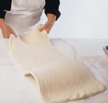 Once the flour is fully incorporated, shape the butter into a slab sandwiched between two sheets of waxed paper or plastic wrap, and chill it.