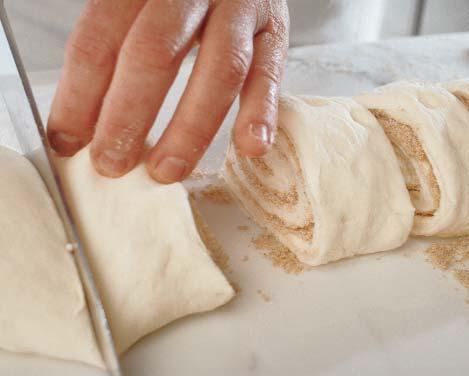 Put the finished dough on a floured surface. Roll it out into a rectangle 1 2-inch thick.