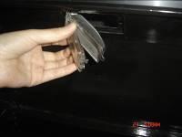 Then remove the light cover.) 3. Loosen the securing the light. 4. Remove the glass cover from the light compartment.