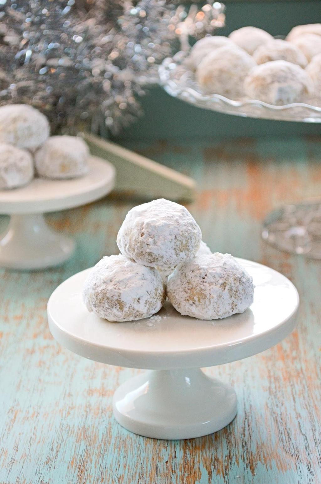 1 cup all-purpose flour 1/8 teaspoon salt 8 tablespoons unsalted butter, room temperature 1/4 cup powdered (confectioners) sugar Extra powdered sugar for rolling 1 teaspoon vanilla 1 cup walnuts or