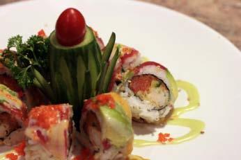 $10.95 Annie s Special Soy Wrap, Kani, Cucumber, Avocado, Cream Cheese (Yellow Tail, Tuna) and Masago with Special Sauce.