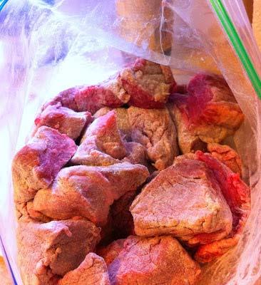 5. Place all the chunked Meat into a big zip lock bag and pour in 3/4 c All Purpose Flour. Seal the bag after removing any air and shake until the Meat is all covered with Flour.