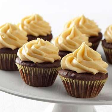 Mini Chocolate Cupcakes With Pumpkin Frosting Yield: 32 cupcakes Prep Time: 5 minutes For Cupcakes 3 4 cup Ghirardelli Unsweetened Cocoa 3 4 cup all-purpose flour 2 teaspoon baking powder 2 teaspoon