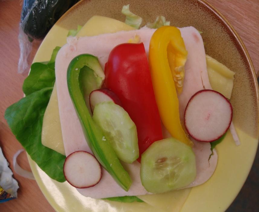 SANDWICHES : SANDWICHES: Ingredients: -bread or rolls -butter -salad -tomatoes -eggs -cucumber -ham -cheese -radish -pepper Lay one piece of bread on your chopping board and spread a thin layer of