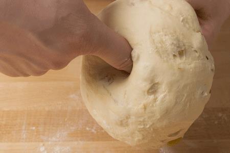Shape a piece of the dough into a ball to fit the size of the mold.