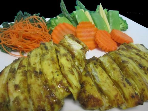 Thai Gai Yang Sliced, charcoal grilled chicken breast.