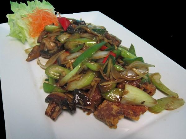 Sweet and Sour Sauteed with bell peppers, tomatoes, onions, carrots, cucumbers, pineapples and scallions in our sweet