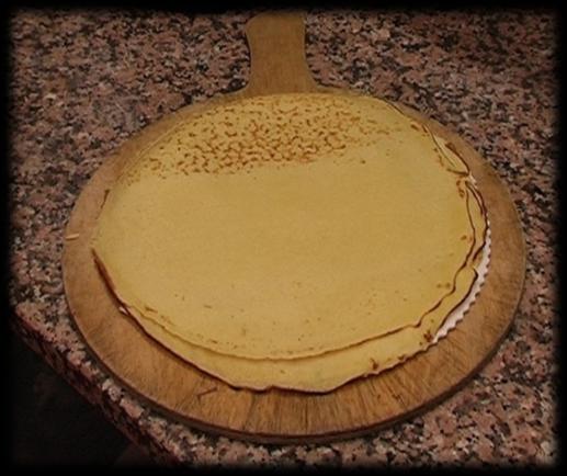 1. Defrost the crepes for 45 minutes to one hour 2. Pre-heat the electric griddle to 180 C 3. Place Chocolate on half the crepe on the smooth, plain side, 4.