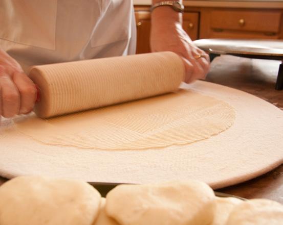 Step 6 Rolling To begin rolling, place your patty down at the center of your prepped pastry board.