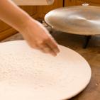 Then either rotate your board slightly or change your angle and roll forward and back. Continue rotating or switching your angles so that you keep your lefse round and of even thickness.