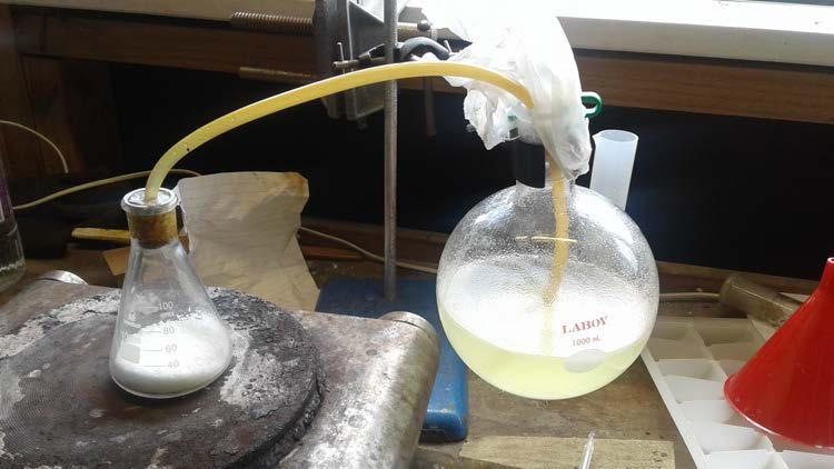 Since the flask I was using was not big enough to hold all the bisulfate and chloride, I opted to only add a portion of the mix at time to the flask.