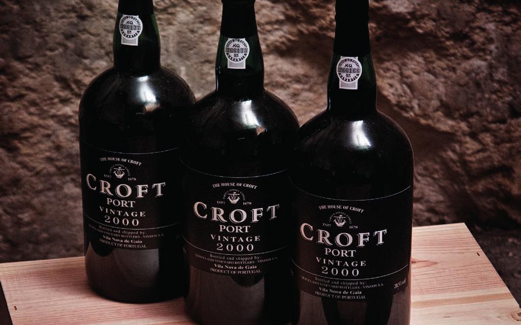 Lot 146 Croft 1994 In original, individual, wooden cases Tasting note: Deep ruby colour with a hint of brick on the rim. Aromatic, plumy, dark chocolate nose.