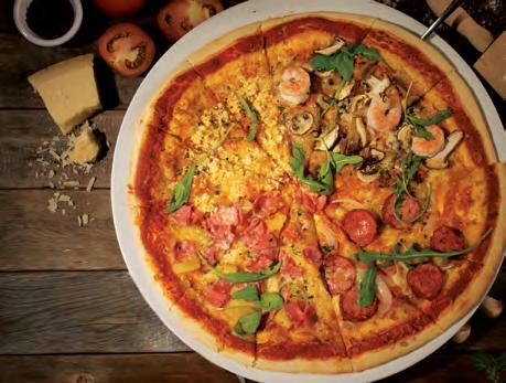 Each pizza comes with a choice of rustic or traditional base, except for Pizza Enorme. Italiannies Special Shrimps, anchovy fillets, mixed mushrooms and mozzarella cheese with a pomodoro base. 44.