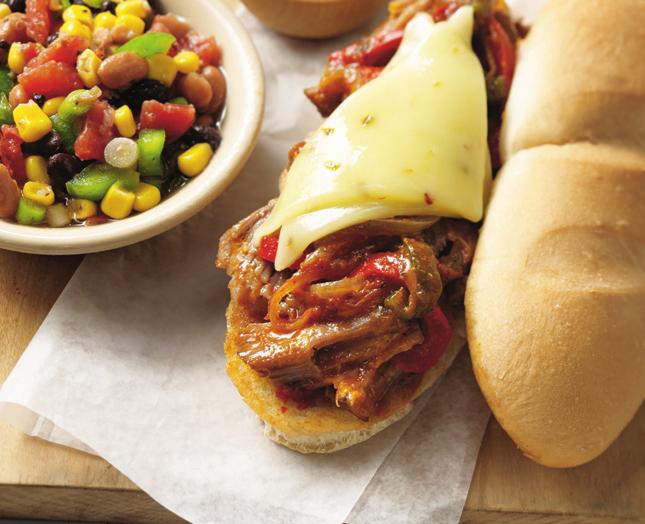 Chipotle Pork Sandwiches 2½ pounds pork shoulder or arm roast, cut into 4 pieces 1 red bell pepper, sliced 1 poblano pepper or green bell pepper, sliced 1 medium onion, sliced 1 cup reduced sodium
